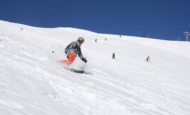Skiers and Riders enjoy new terrain on Peak 6