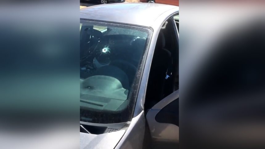 bullet hole stolen car Cropped