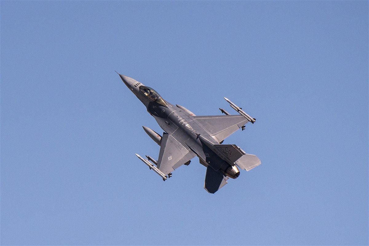 An F-16 Fighting Falcon aircraft from the 120th Fighter Squadron, piloted by Capt. Phillip Butler, performs a fly-by maneuver over the runway after returning from a practice alert scramble that is intended to enhance proficiency training for pilots and crew of the unit at Buckley Air Force Base, Colo., March 31, 2020. While many members of the 140th Wing, Colorado Air National Guard, are currently under a stay-at-home order due to the COVID19 virus, there are still a number of essential employees who are keeping the mission going during this unprecedented time in our nation's history.  (U.S. Air National Guard photo by Senior Master Sgt. John Rohrer)