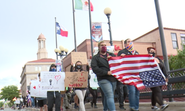 Protesters against police brutality near Pueblo Riverwalk Monday night.