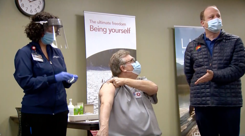 Healthcare workers receive Pfizer COVID-19 vaccine in Fort Collins, CO