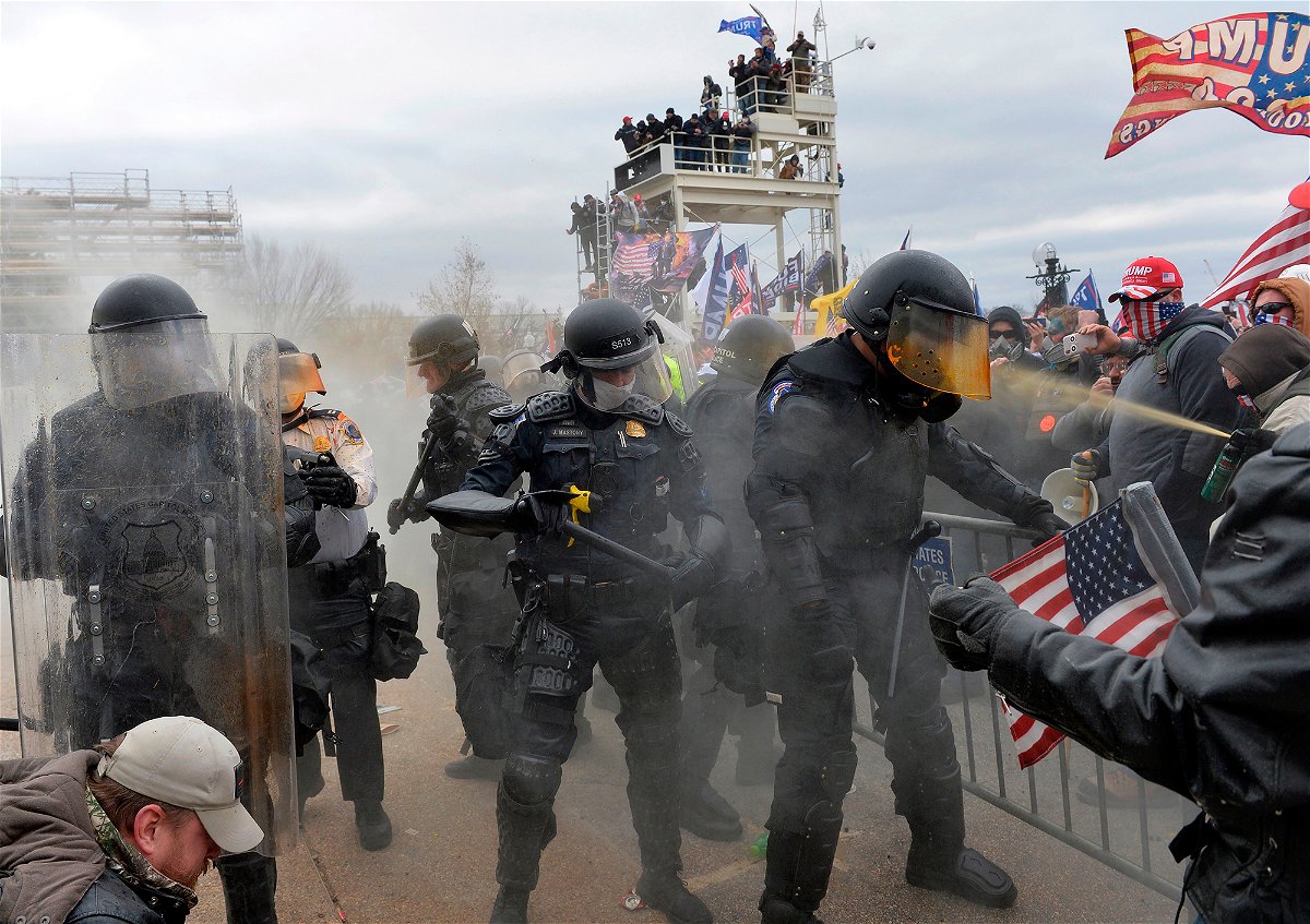 Trump supporters clash with police and security forces as they try to storm the US Capitol in Washington, DC on January 6, 2021. - Demonstrators breeched security and entered the Capitol as Congress debated the a 2020 presidential election Electoral Vote Certification. (Photo by Joseph Prezioso / AFP) (Photo by JOSEPH PREZIOSO/AFP via Getty Images)