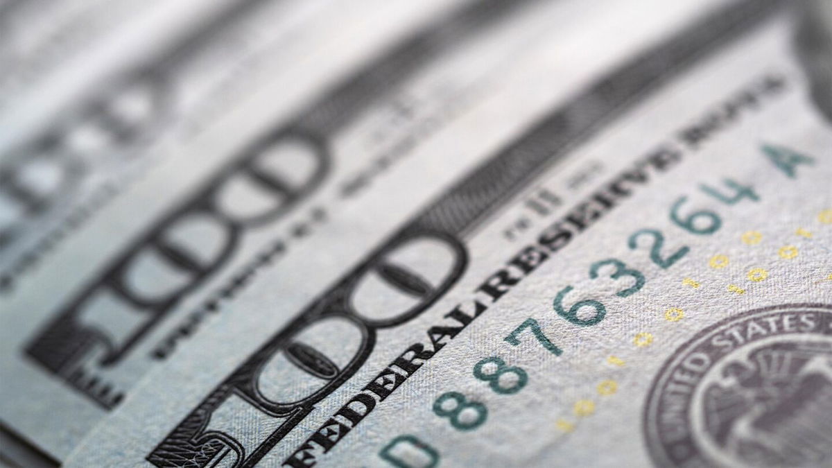 UKRAINE - 2020/07/09: A photo illustration of US 100 dollar bills. (Photo Illustration by Igor Golovniov/SOPA Images/LightRocket via Getty Images)