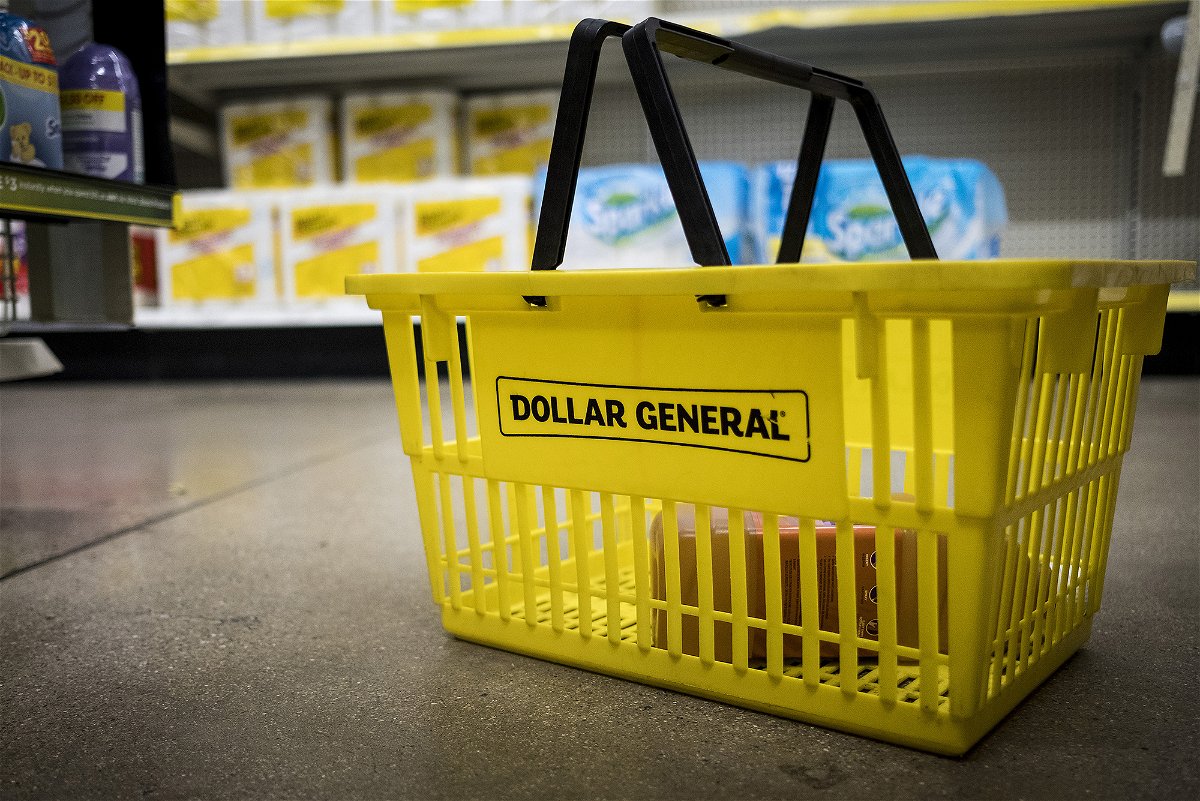 A shopping basket sits on the floor inside a Dollar General Corp. store in Chicago, Illinois, U.S., on Wednesday, Nov. 29, 2017. Dollar General is scheduled to release earnings figures on December 7. Photographer: Christopher Dilts/Bloomberg via Getty Images