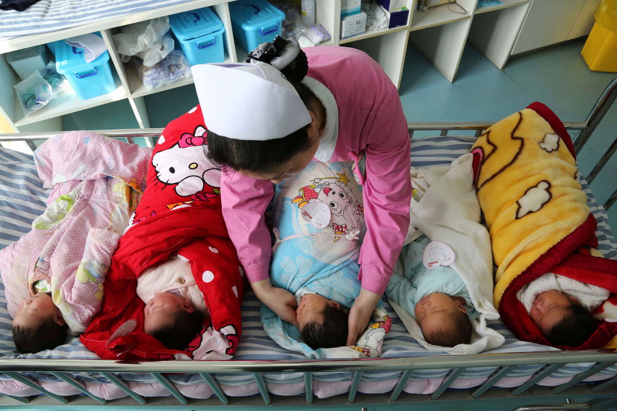 --FILE--A Chinese nurse attends newborn babies at a hospital in Xiangyang city, central China's Hubei province, 22 February 2018. China is reported to be planning to eliminate the law that says each family can only have two children. China, the most populous nation in the world, is said to be planning to remove all limits on the number of children a family can have, according to people familiar with the matter, in what would be a historic move to end to a policy that caused many controversial disputes and left the world's second-largest economy short of labor. The State Council, China's cabinet, has commissioned research on the repercussions of ending the country's policy which has lasts roughly four decades and intends to enact the change nationwide, said the people, who asked not to be named. The leadership wants to reduce the pace of aging in China's population and remove a source of international criticism, one of the people said.  (Imaginechina via AP Images)