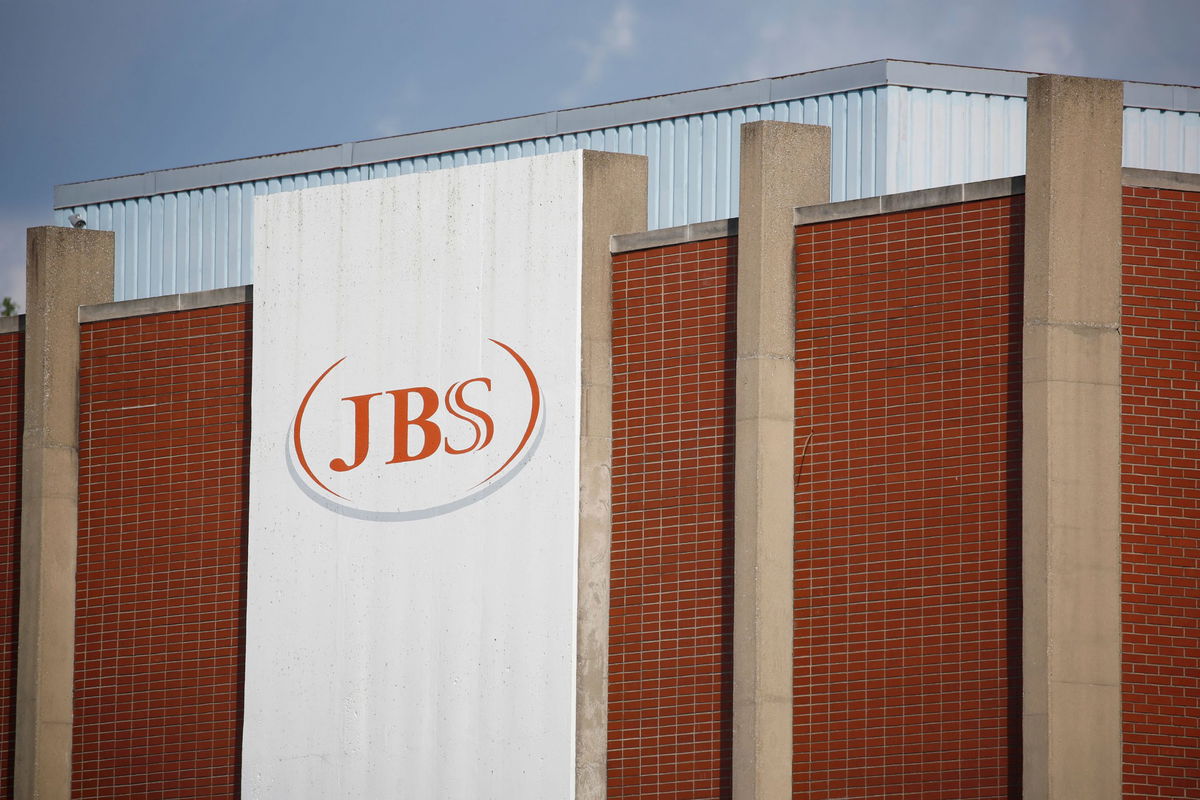 Signage is displayed outside the JBS SA pork processing plant in Louisville, Kentucky, U.S., on Friday, June 5, 2020. JBS USA and three other meat processors were accused in Minneapolis federal court of conspiring to inflate the price of beef through an industrywide scheme that's coming to light thanks to federal investigations prompted in part by shortages during the coronavirus pandemic. Photographer: Luke Sharrett/Bloomberg via Getty Images