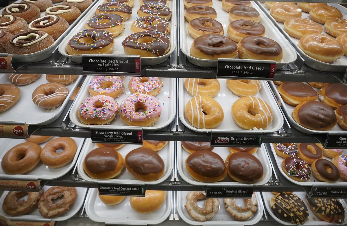 Donuts are on display inside the new Krispy Kreme flagship store amid the coronavirus pandemic in Times Square, New York, September 15, 2020. - The 4,500 square-foot donut shop includes a glaze waterfall, a 24-hour street pick-up window, and a system that can make more than 4,500 donuts an hour. (Photo by TIMOTHY A. CLARY / AFP) (Photo by TIMOTHY A. CLARY/AFP via Getty Images)