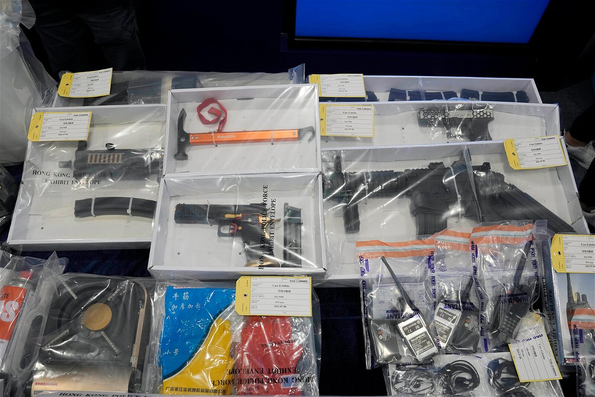<i>Kin Cheung/AP</i><br/>Confiscated evidence from the alleged plot was put on display July 6.