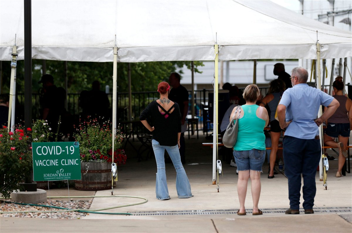 <i>Nathan Papes/Springfield News-Leader/Imagn</i><br/>People line up for the vaccine at Mother's Brewing Company in Springfield