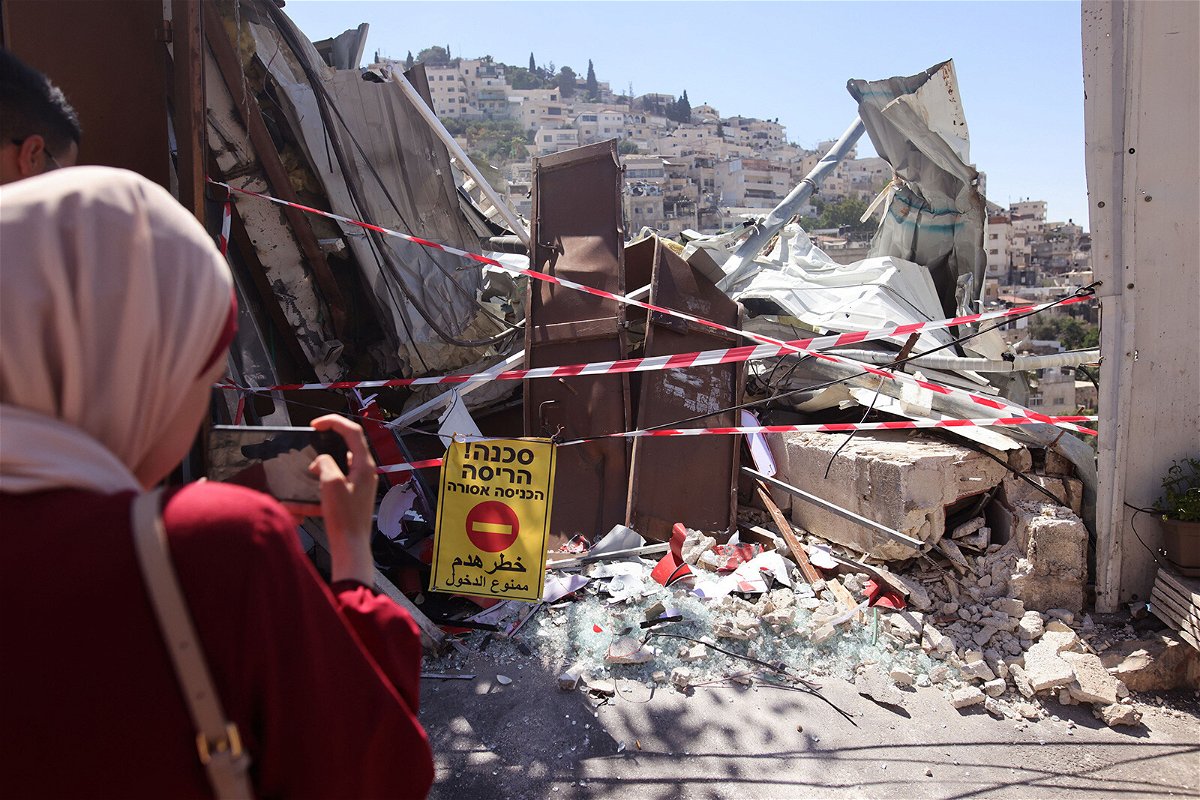 <i>Ahmad Gharabli/AFP/Getty Images</i><br/>Israeli forces have demolished a building in the East Jerusalem neighborhood of Al Bustan