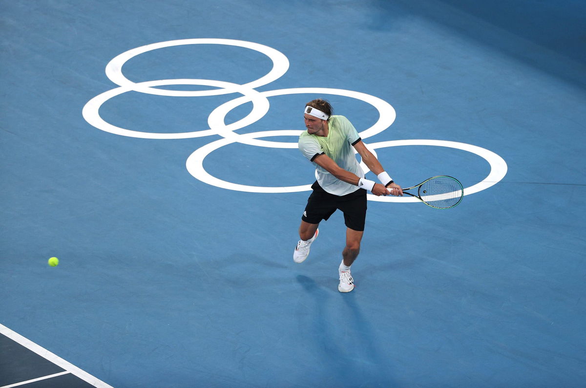 <i>Ezra Shaw/Getty Images</i><br/>Germany's Alexander Zverev plays Karen Khachanov of the Russian Olympic Committee for the gold medal in men's singles. Zverev is shown playing a backhand during his men's singles semifinal match against Novak Djokovic of Serbia in the Tokyo 2020 Olympic Games on July 30