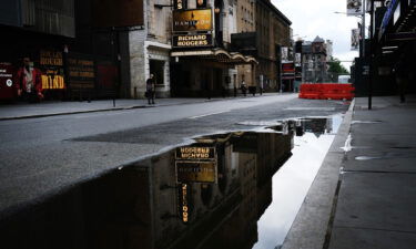 Owners and operators of all 41 Broadway theaters in New York City will require audience members and performers as well as staff to be vaccinated for all performances through the month of October. In this picture Broadway theaters are closed along an empty street in the theater district on June 30