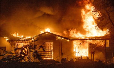 A house burns on Platina Road at the Zogg Fire near Ono