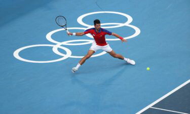 Novak Djokovic plays a forehand against Alexander Zverev.