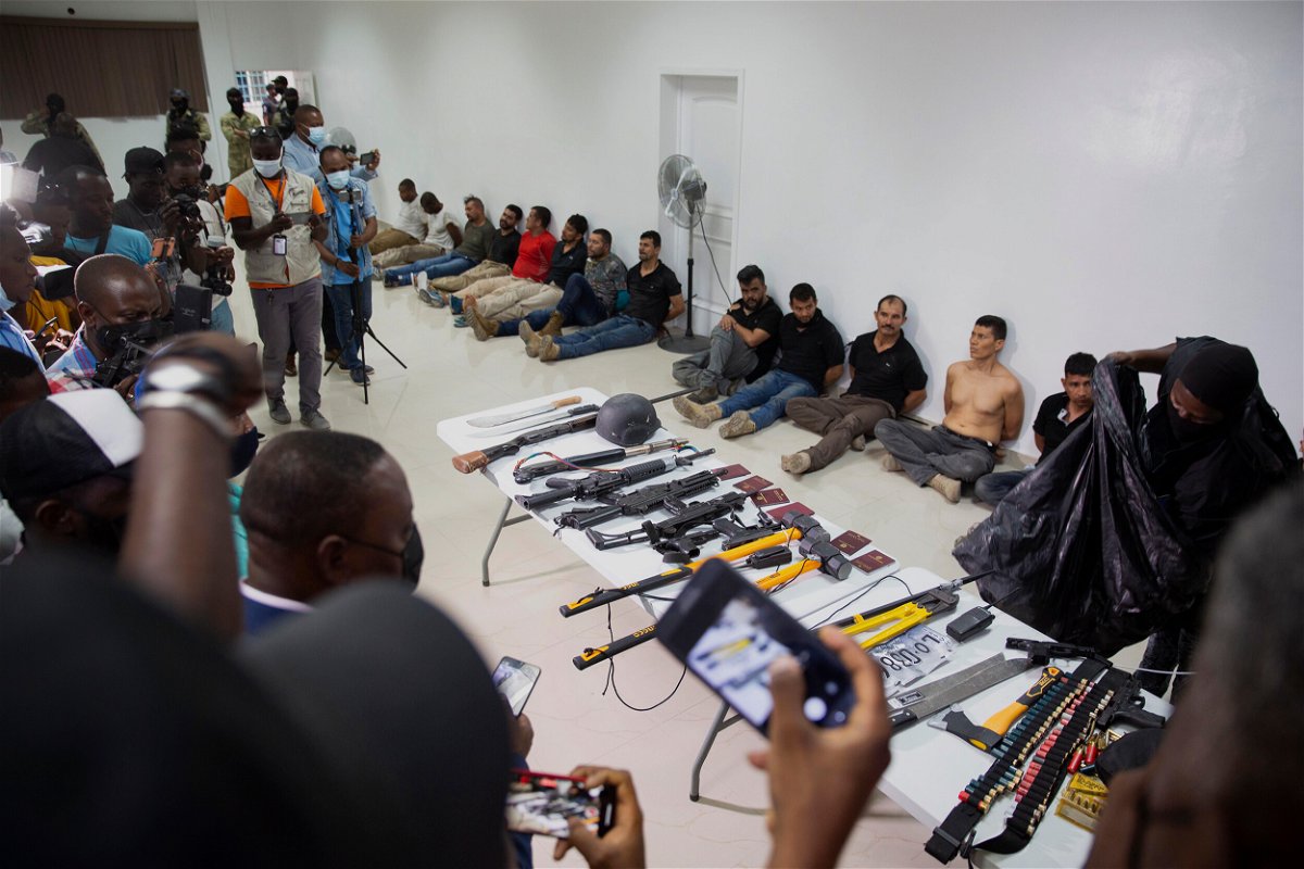<i>Joseph Odelyn/AP</i><br/>Haiti's police chief described the men presented at the press conference as attackers that have been apprehended.
