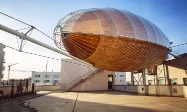 The Dox center features an airship-like structrure used as events space.