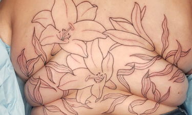 Tattoo artist Carrie Metz Caporusso designs 'roll flower' tattoos specifically for plus-size bodies.