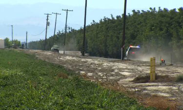 Police on their way to the site of the helicopter crash in Colusa