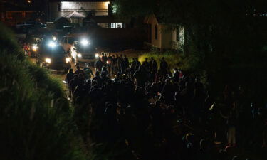 United States Border Patrol agents process migrants who crossed the US-Mexico border into the United States in Roma