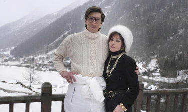 Adam Driver stars as Maurizio Gucci and Lady Gaga as Patrizia Reggiana in "House of Gucci."