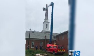 Asheville fire crews are on scene for a bucket truck that had malfunctioned during maintenance on a church steeple.