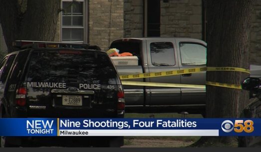 <i>WDJT</i><br/>Police examine the scene of a weekend shooting in Milwaukee