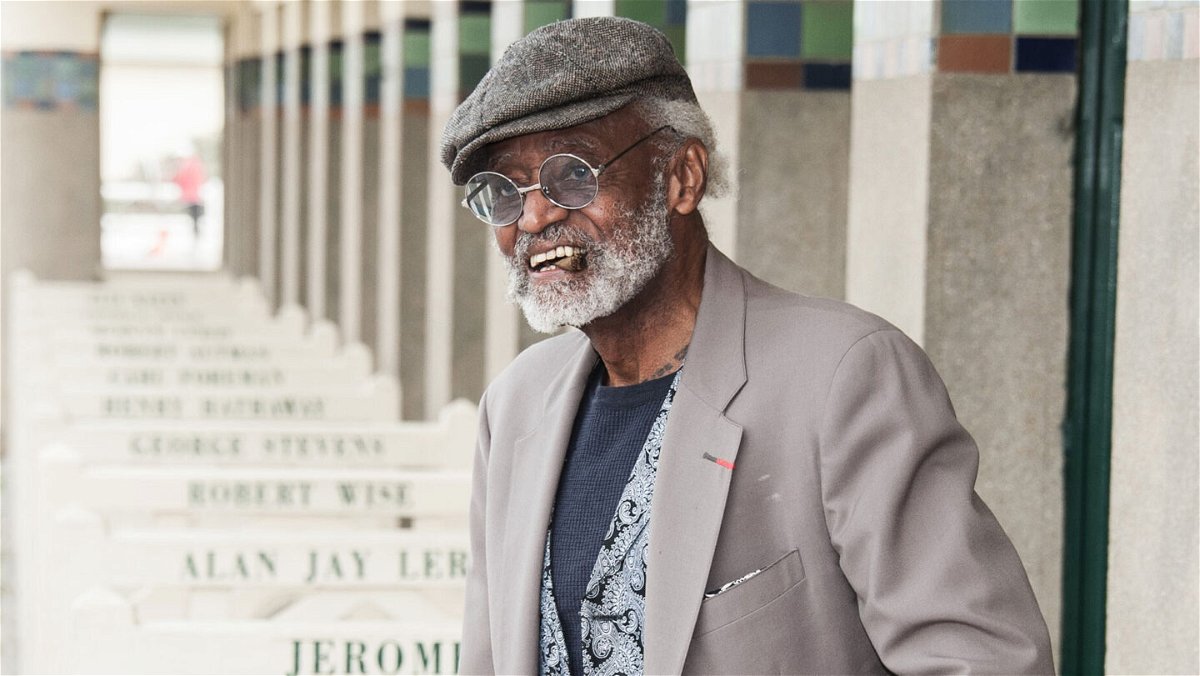 <i>Francois Durand/Getty Images</i><br/>Melvin Van Peebles poses next to the beach closet dedicated to him on the Promenade des Planches in 2012 in Deauville
