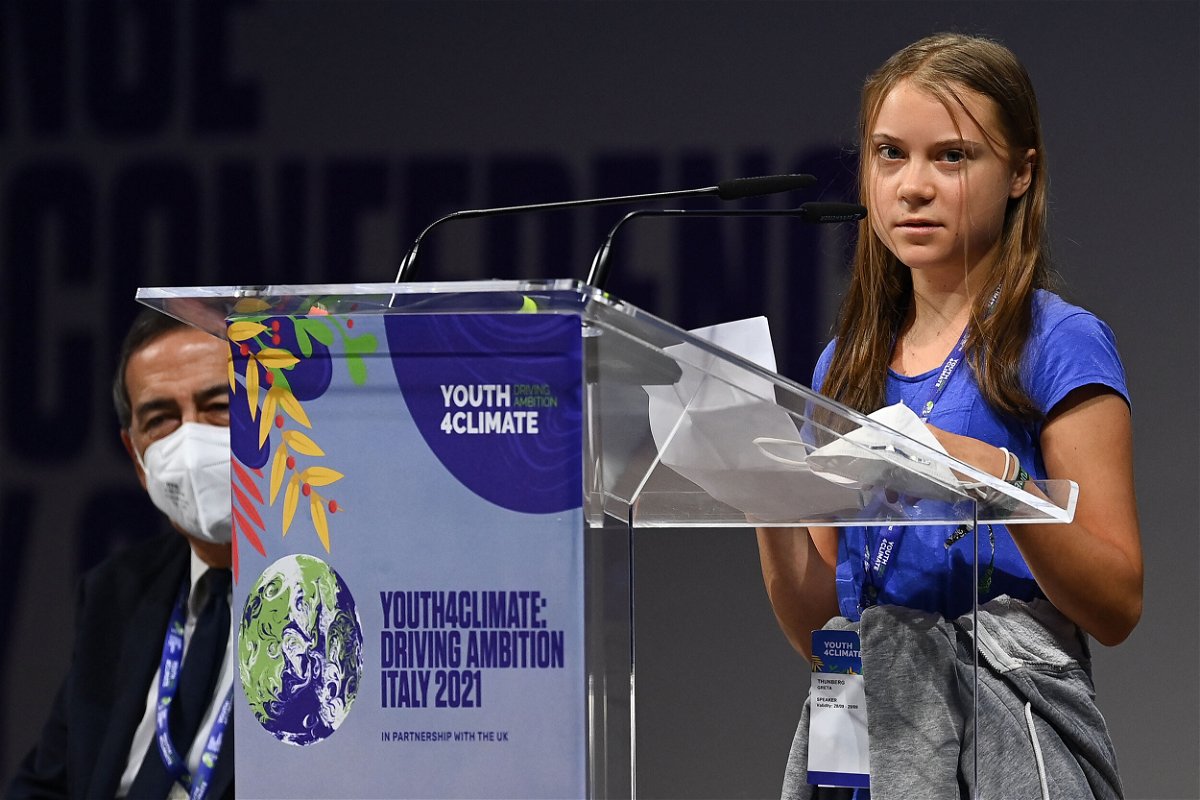 <i>MIGUEL MEDINA/AFP/AFP via Getty Images</i><br/>Swedish climate activist Greta Thunberg delivers a speech during the opening plenary session of the Youth4Climate event on September 28 in Milan.