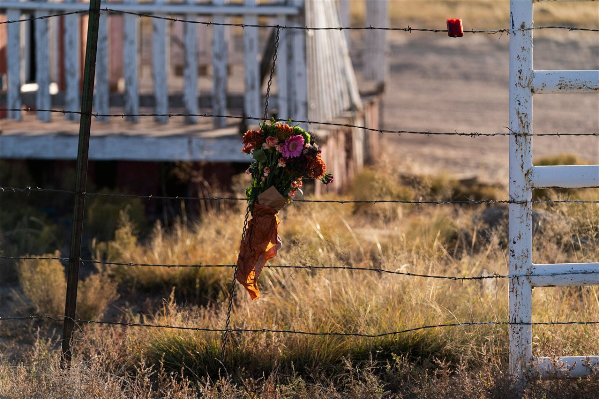 <i>Jae C. Hong/AP</i><br/>A bouquet of flowers honoring cinematographer Halyna Hutchins outside the Bonanza Creek Ranch in Santa Fe