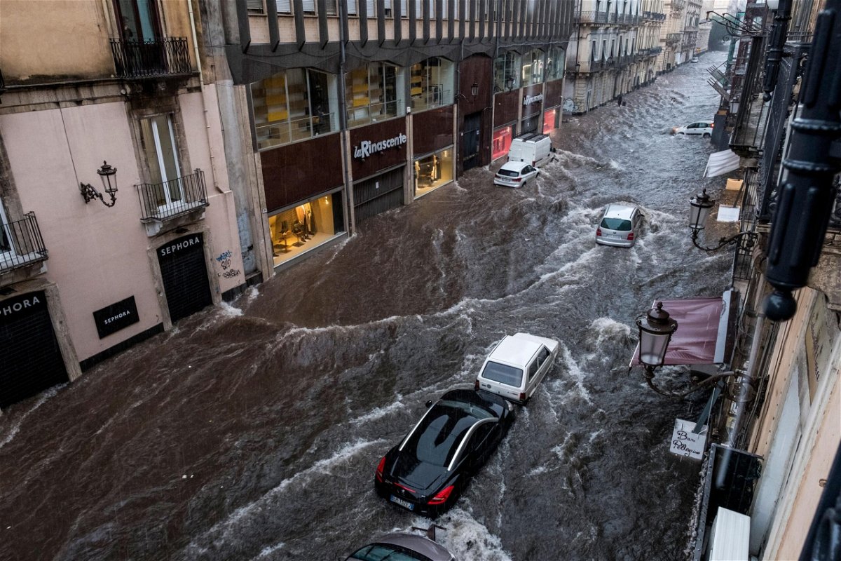 <i>Sanne Derks/Getty Images</i><br/>The Via Etnea turned into a river due to heavy rainfall on October 26.