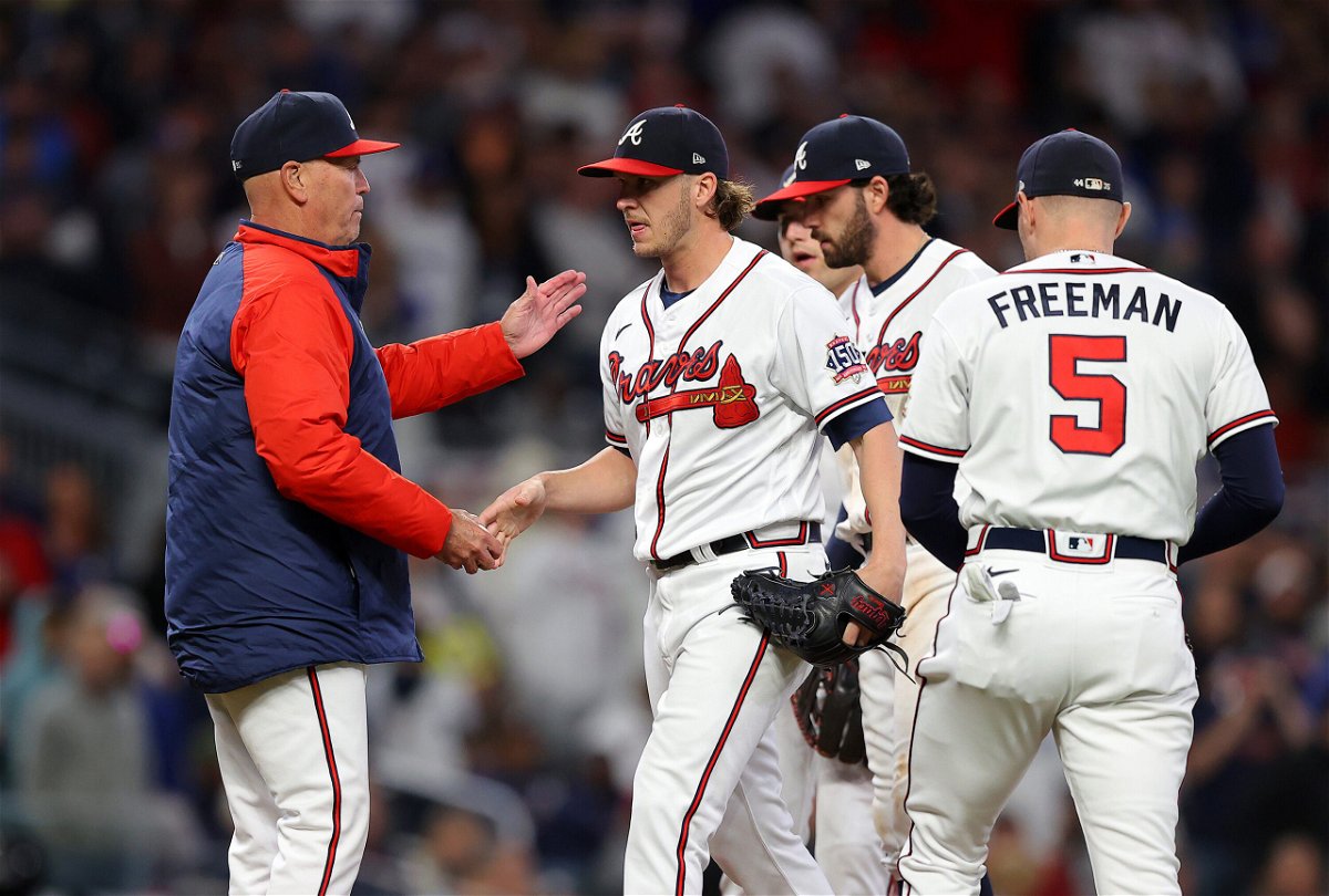 <i>Todd Kirkland/Getty Images</i><br/>Braves manager Brian Snitker takes out Jacob Webb in the sixth innings of the team's game against the Los Angeles Dodgers.