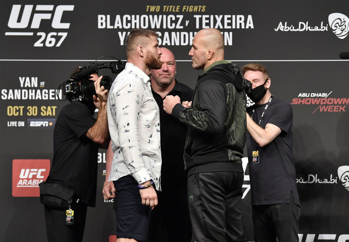 <i>Chris Unger/Zuffa LLC/Getty Images</i><br/>Jan Blachowicz (left) and Glover Teixeira (right) face off during the UFC 267 press conference.