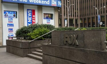 Rupert Murdoch and Roger Ailes launched Fox News 25 years ago Thursday. A Fox News sign at the News Corporation headquarters building is shown here in New York City on March 25