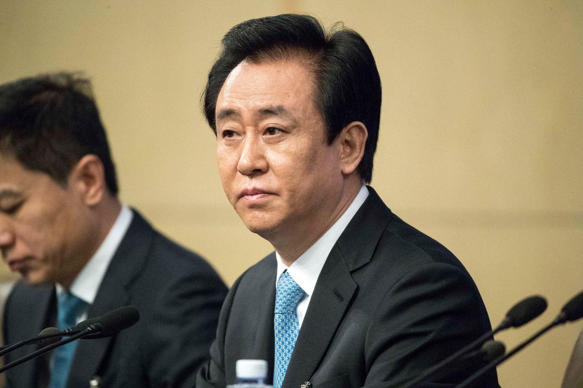 <i>VCG/Getty Images</i><br/>Evergrande chairman Xu Jiayin has sold more than 7 billion yuan ($1.1 billion) worth of personal assets to prop up his embattled company. Xu Jiayin is shown here on March 9