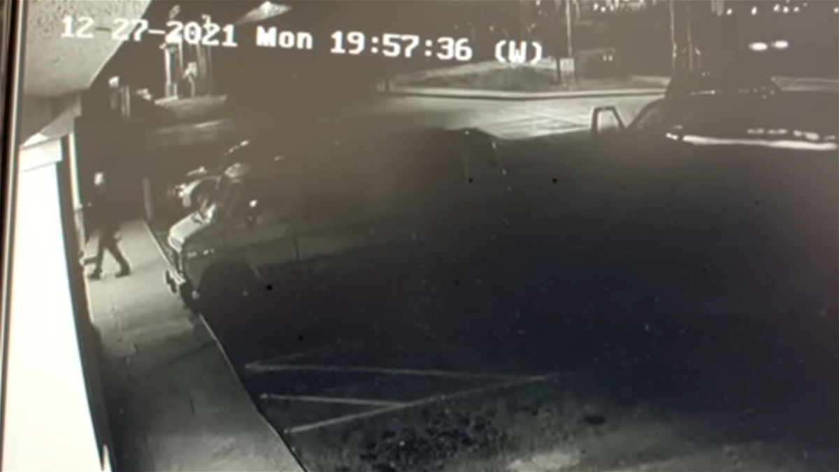 Surveillance video shows a suspect walk into a Denver-area tattoo parlor before opening fire Monday, Dec. 27.
