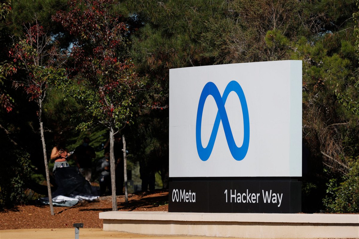 <i>Justin Sullivan/Getty Images</i><br/>A sign with a new logo and the name 'Meta' is displayed in front of Facebook headquarters on October 28