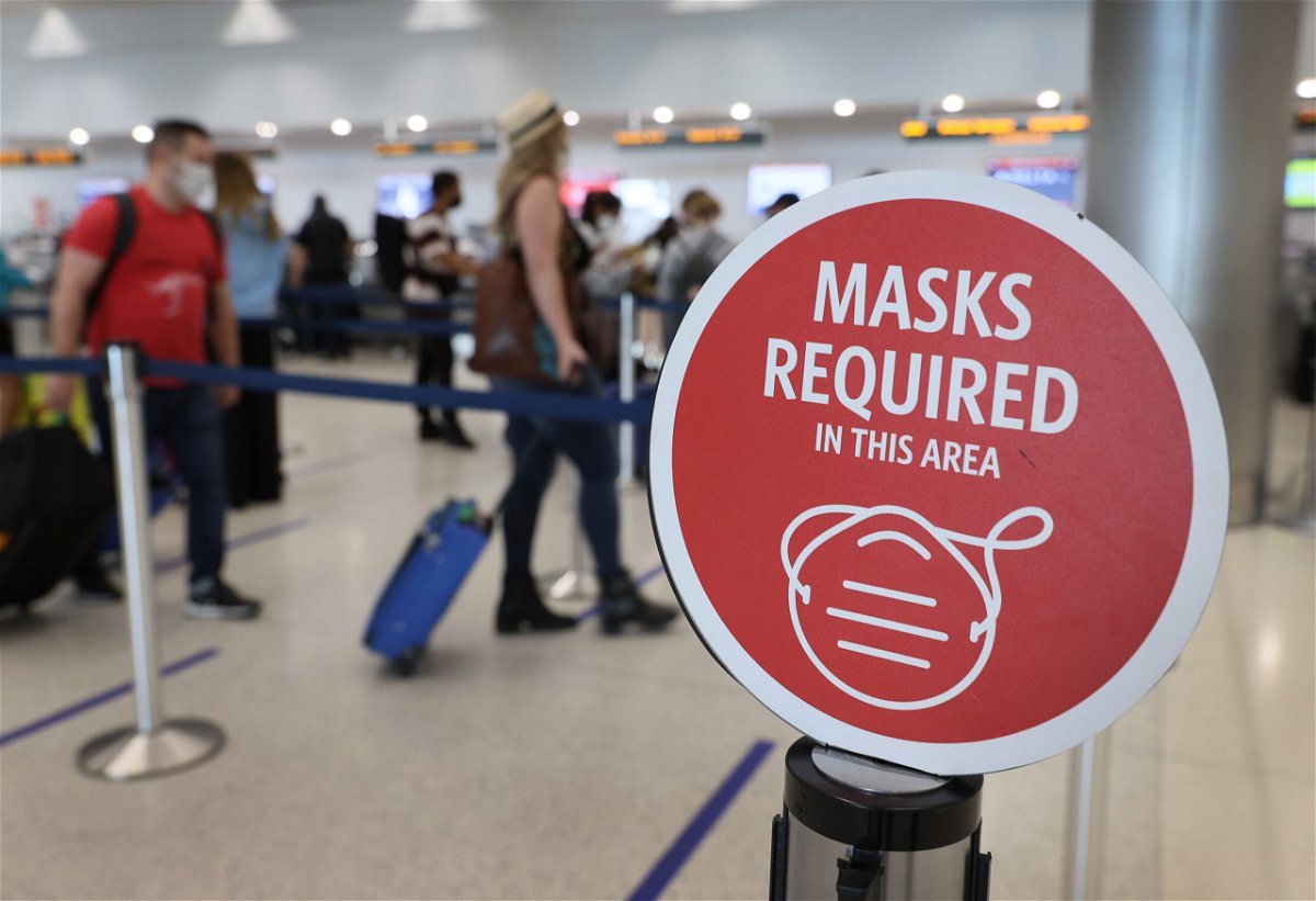 <i>Joe Raedle/Getty Images</i><br/>The Biden administration will extend existing requirements for travelers to wear masks on airplanes