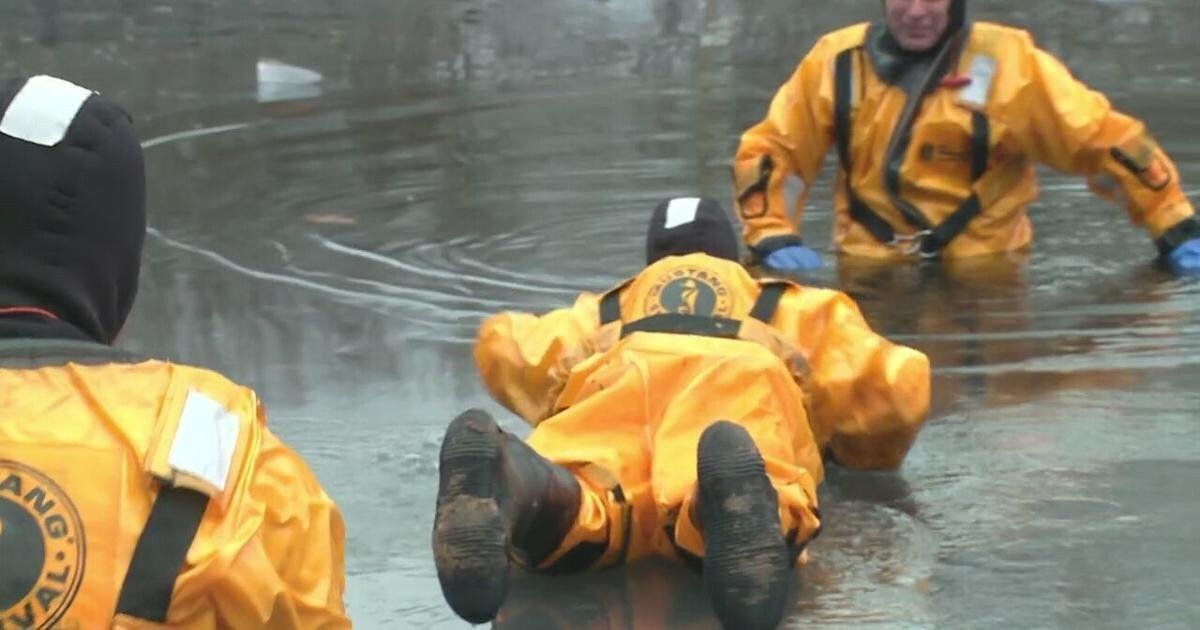 <i>KMOV</i><br/>Members of the St. Louis Fire Department's ice rescue training team perform drills on January 23