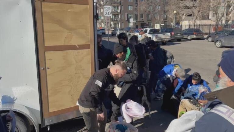<i>KCNC</i><br/>Andrew Canales' Homeless Outreach Team hands out warm weather essentials to people experiencing homelessness in Denver
