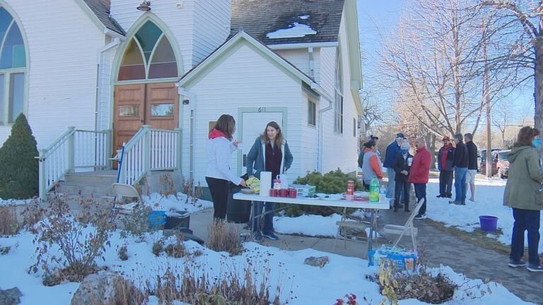 <i>KCNC</i><br/>Volunteers stand in front of the Community Christ Church in Longmont