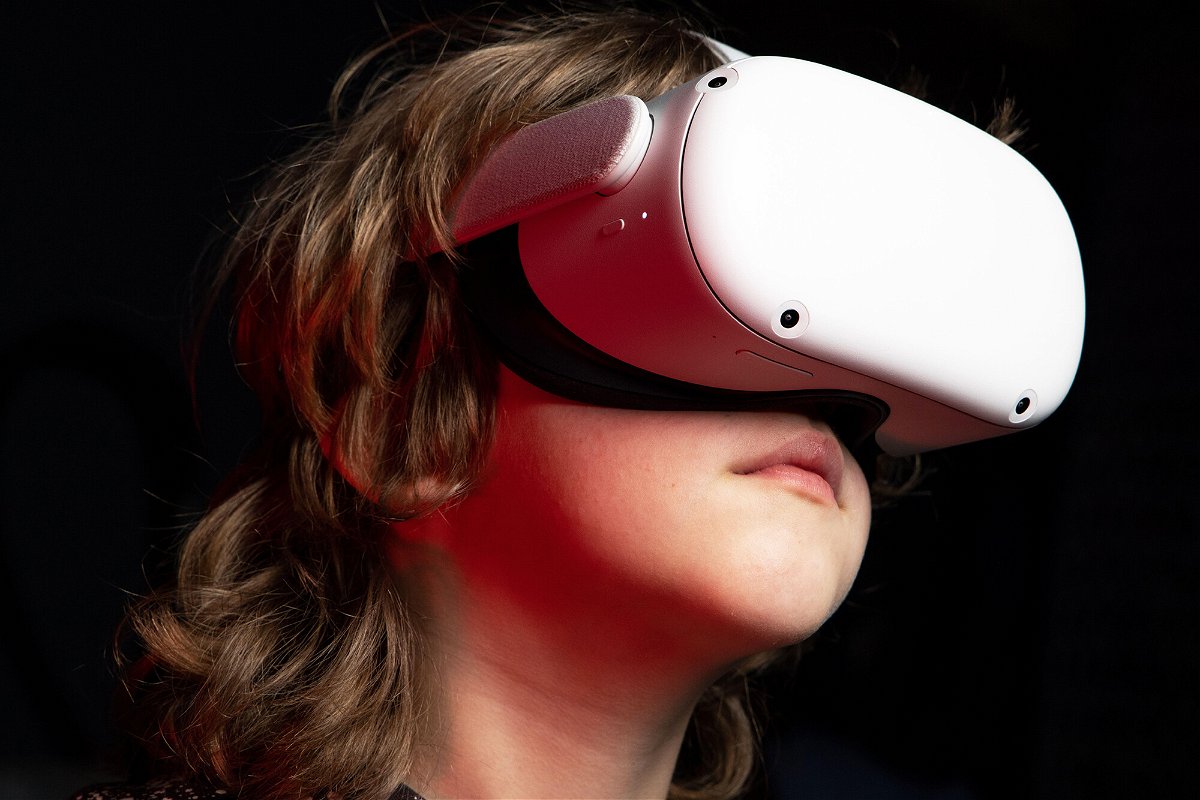 <i>Boumen Japet/Alamy Stock Photo</i><br/>A child wearing an Oculus Quest 2 VR head set.