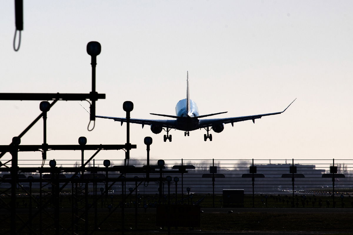 <i>Nicolas Economou/NurPhoto/Getty Images</i><br/>Dutch authorities discovered a stowaway hiding in the nose wheel of a cargo plane when it landed at Amsterdam's Schiphol Airport Sunday morning.