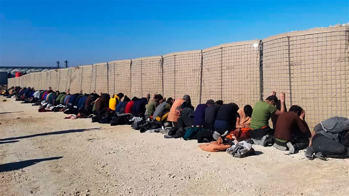<i>Kurdish-led Syrian Democratic Forces via AP</i><br/>This photo provided by the Kurdish-led Syrian Democratic Forces shows some Islamic State group fighters who were arrested.