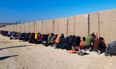 This photo provided by the Kurdish-led Syrian Democratic Forces shows some Islamic State group fighters who were arrested.
