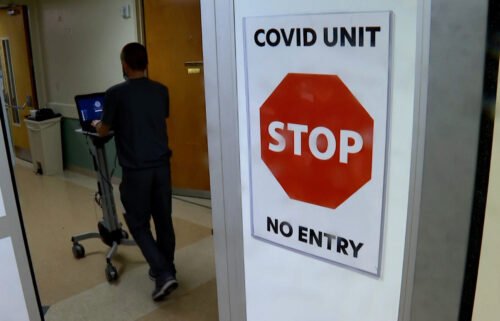 A sign warning of a Covid Unit is displayed in a Kentucky hospital.