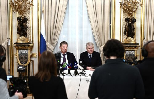 The Kremlin's deputy chief of staff Dmitry Kozak and Russian Ambassador to France Alexey Meshkov hold a news conference at the Russian Ambassador's residence in Paris on January 26
