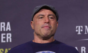 Joe Rogan introduces fighters during the UFC 269 ceremonial weigh-in  at MGM Grand Garden Arena on December 10