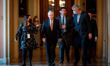 Senate Minority Leader Mitch McConnell (R-KY) speaks to reporters after speaking in the Senate Chamber at the U.S. Capitol on February 17.