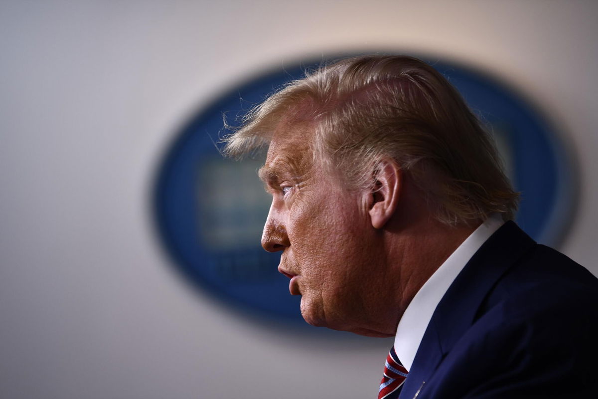 <i>Brendan Smialowski/AFP/Getty Images</i><br/>Former President Donald Trump speaks during a briefing at the White House September 27