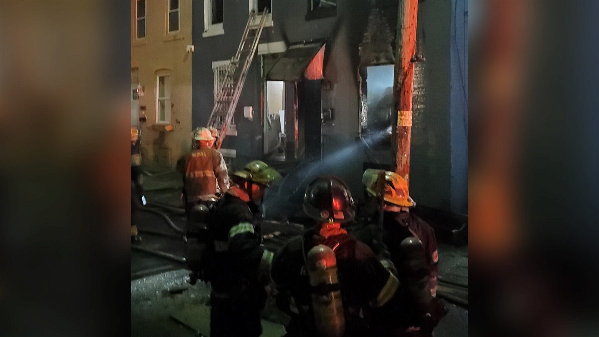 <i>Philadelphia Fire Department/Twitter</i><br/>The scene of a house fire that killed a woman and three children is seen in this photo shared by the Philadelphia Fire Department on Sunday.